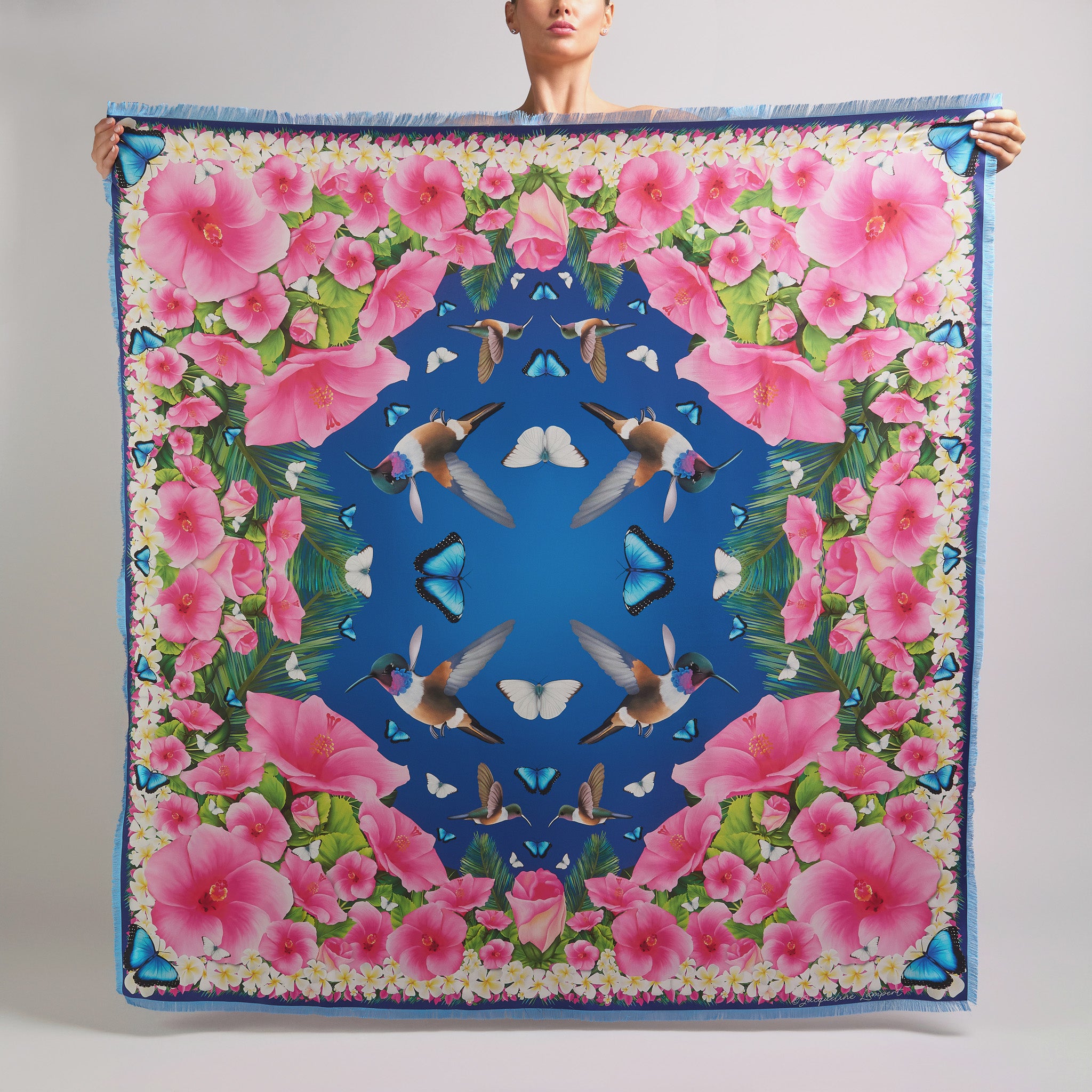 Midnight blue grande silk scarf featuring hand-drawn Bahama Woodstar hummingbirds, hibiscus flowers, blue morpho butterflies, Great Southern White butterflies, palm leaves, and frangipani inspired by the Caribbean