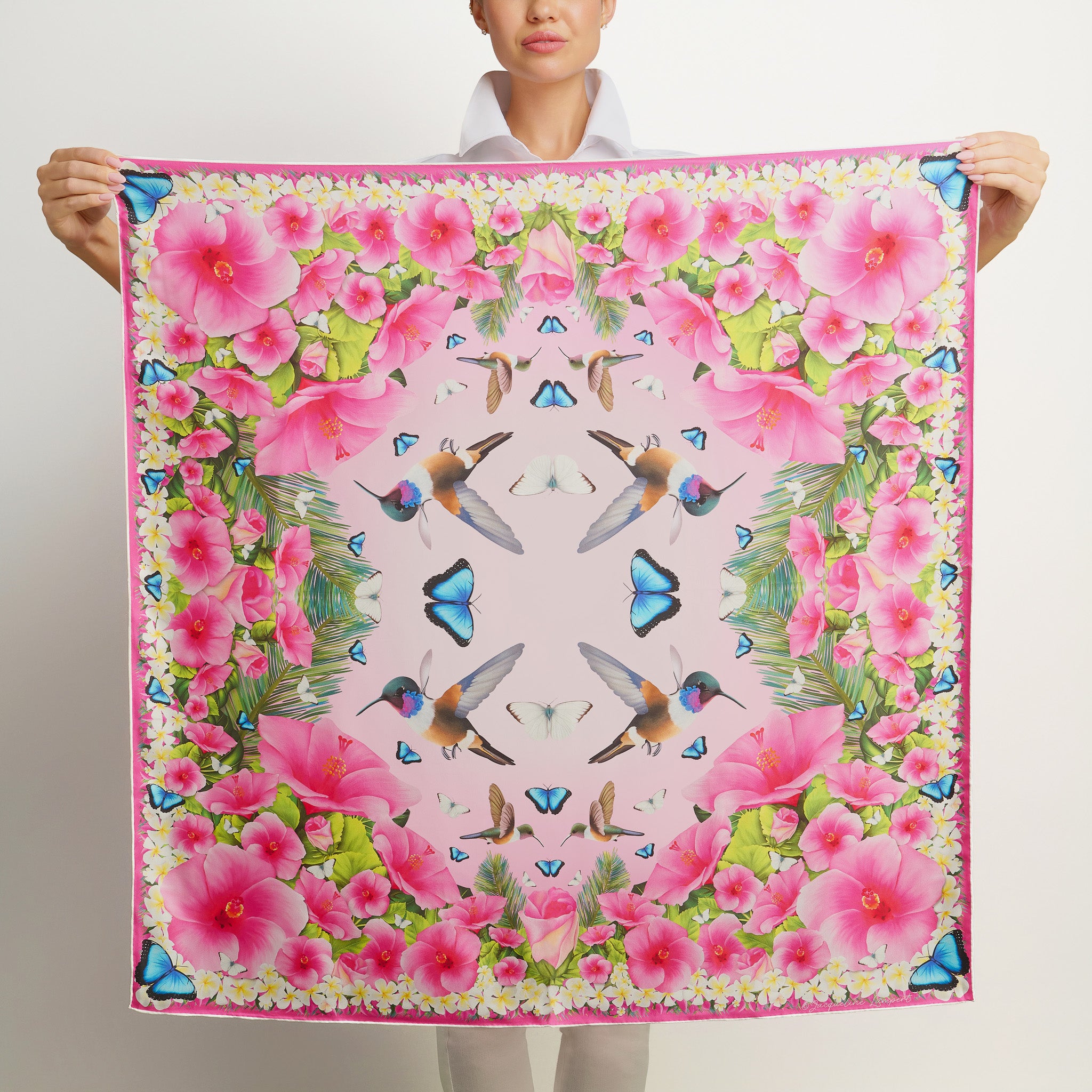 Pale pink luxury silk scarf featuring hummingbirds hibiscus blooms frangipani flowers and butterflies.
