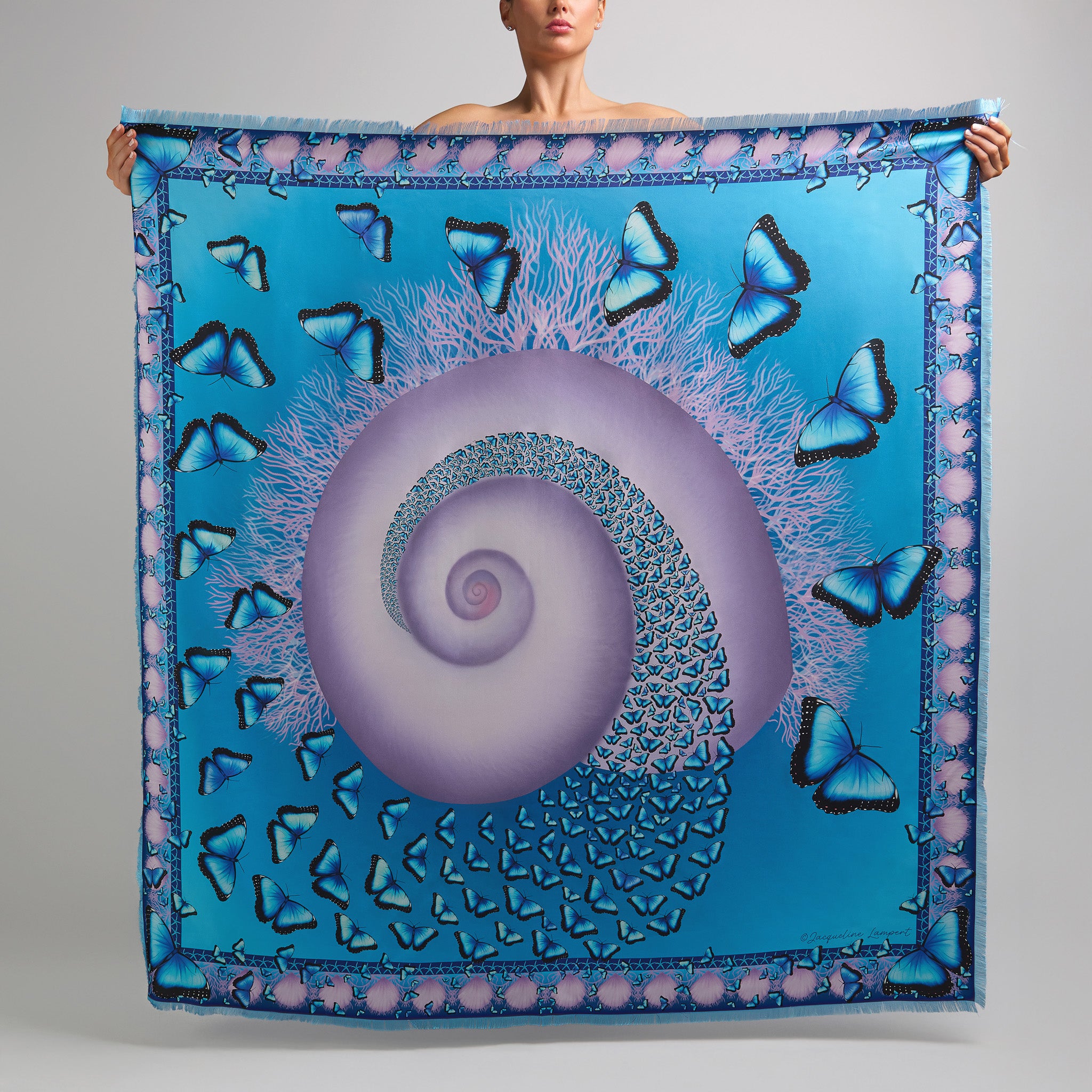 Turquoise luxury silk scarf with hand-drawn blue morpho butterflies, Janthina shell, coral details, and seashell border.